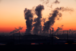 Sunset photo of power plant smokestacks
