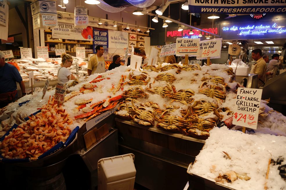 Fresh seafood shop with loads of whole crab, which are already affected by ocean acidification