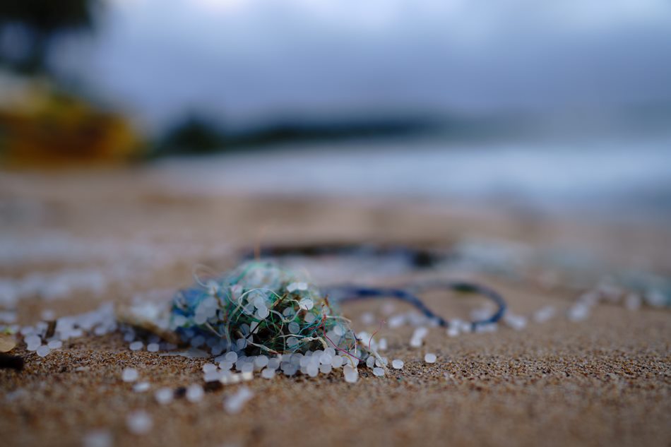 Small pieces of plastic on a beach