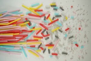 Colorful plastic straws breaking into smaller pieces